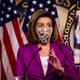 Illustration for article titled Woman Who Stormed Capitol MAY Have Taken Nancy Pelosi's Laptop and MAY Have Intended to Give It to Russia